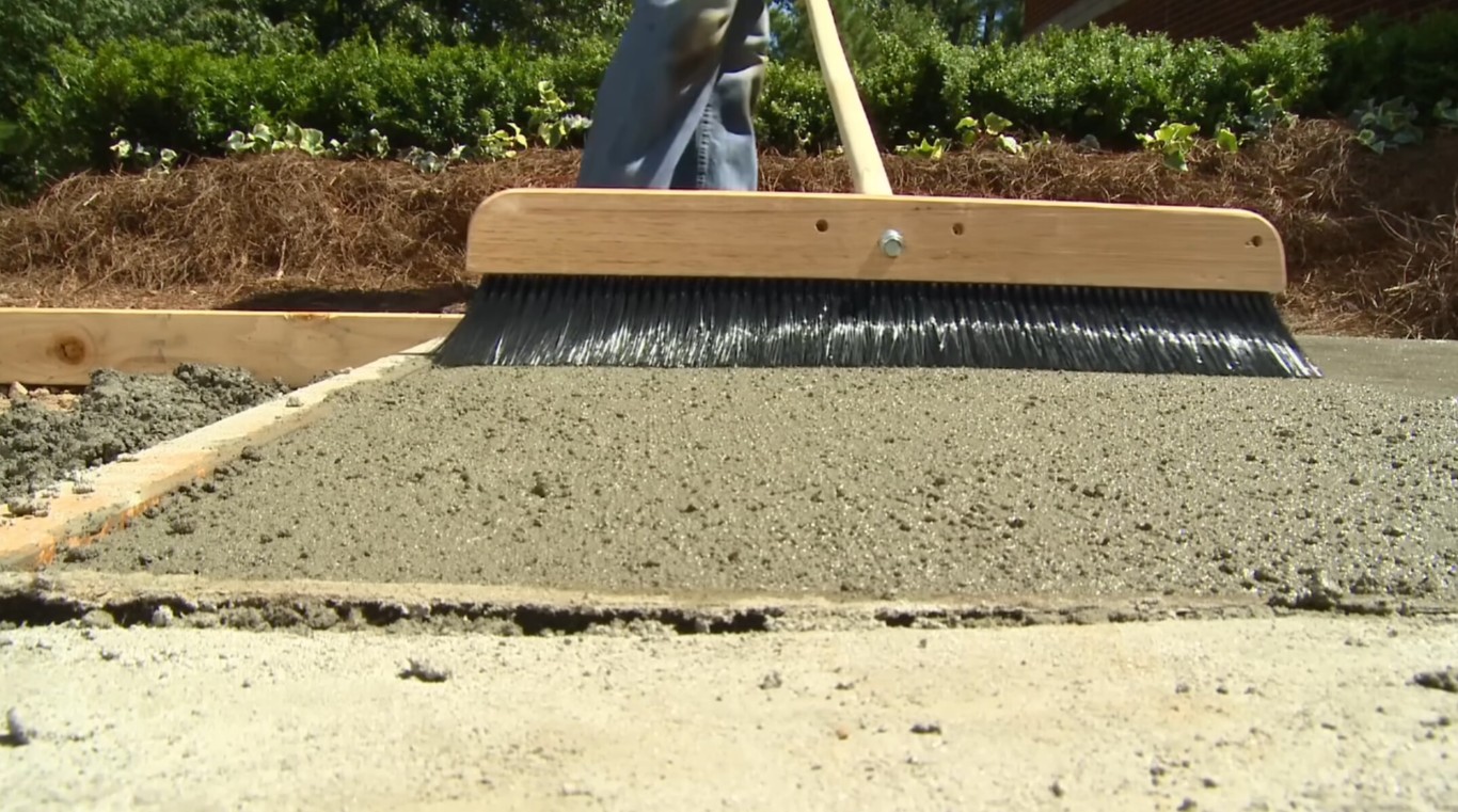 Precision concrete finishing technique with broom texture for slip resistance in Franklin, TN